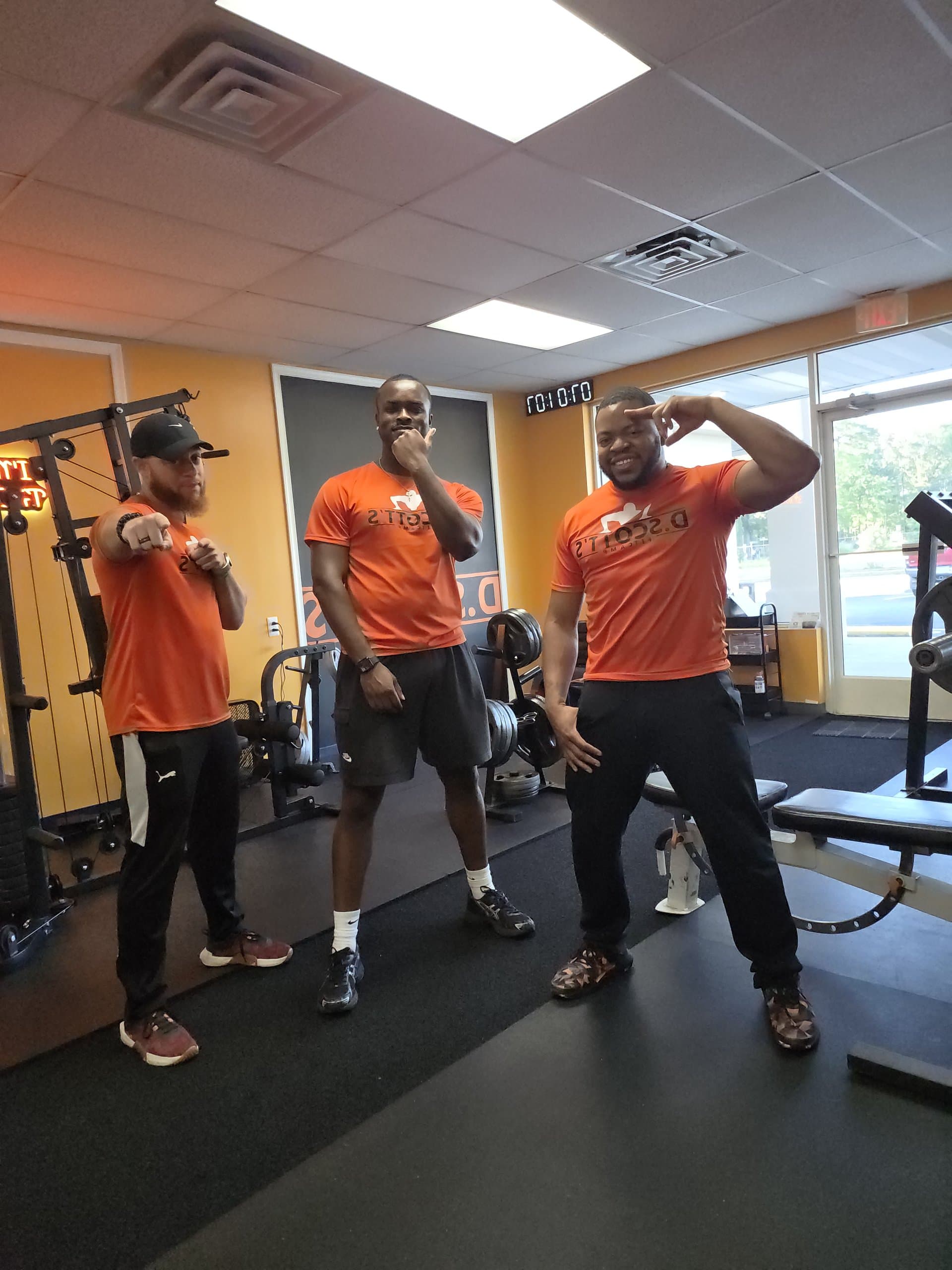 Coaches in DScottsFitCamp shirts at the Newport News studio