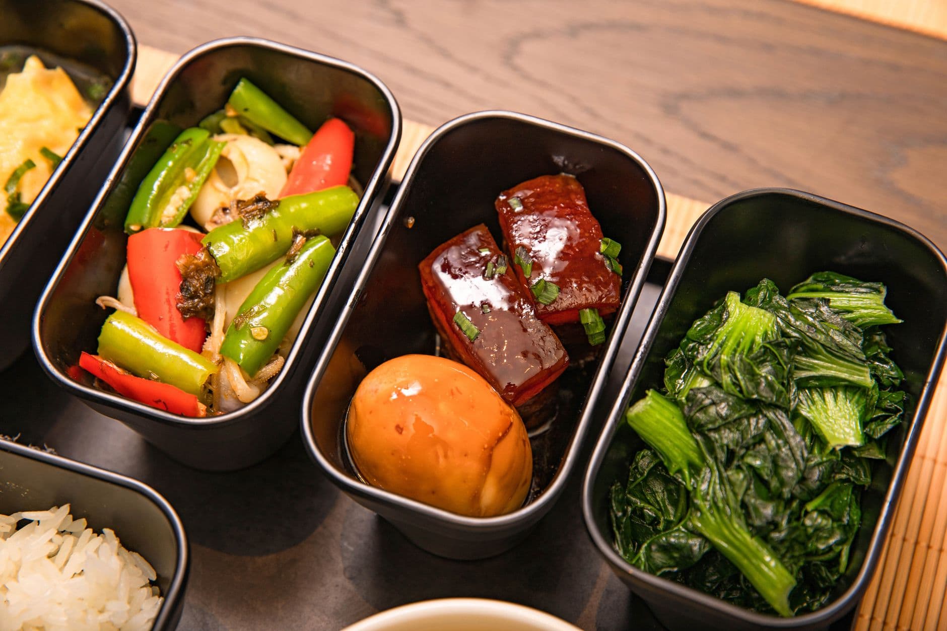A prepared meal of lean protein, greens and rice